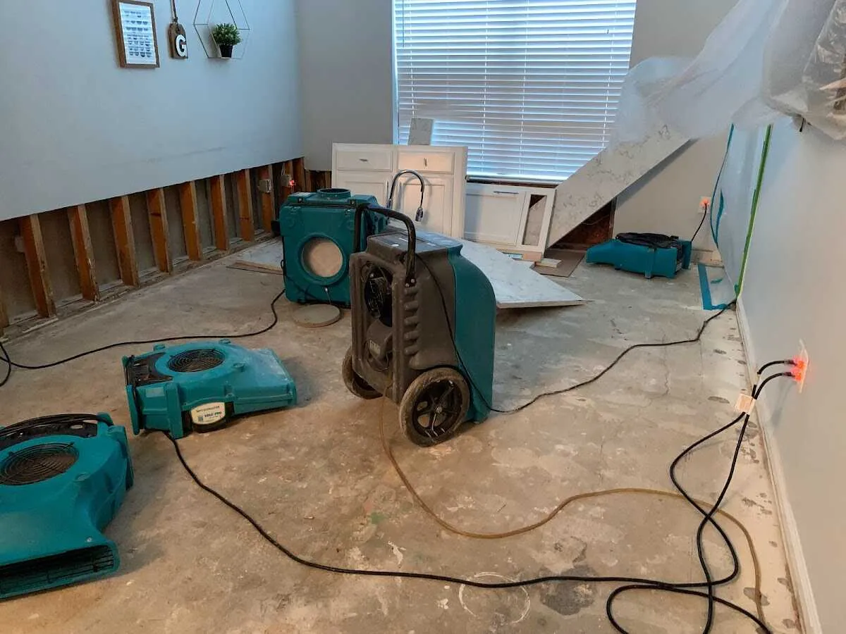 Dehumidifier in flood-cut room for Water Damage Restoration in Wheeling